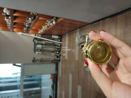 Accessori di cristallo all'ingrosso dell'asta della tenda dei finials del metallo del palo della tenda dell'oro per le aste della tenda